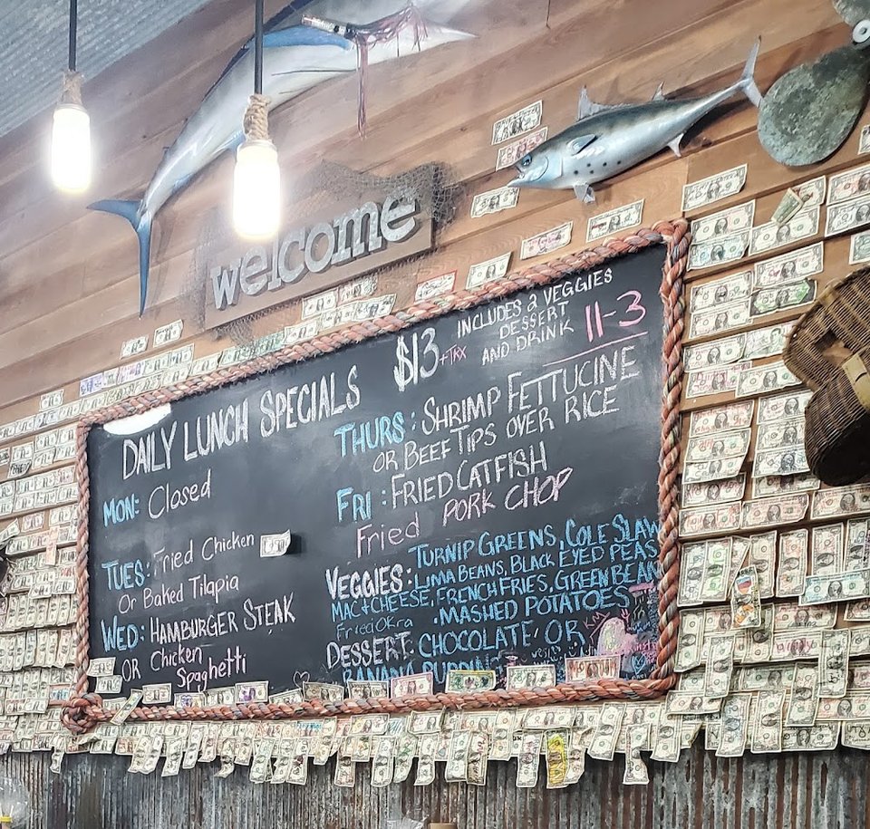 Seafood menu featuring shrimp, catfish, and oysters.